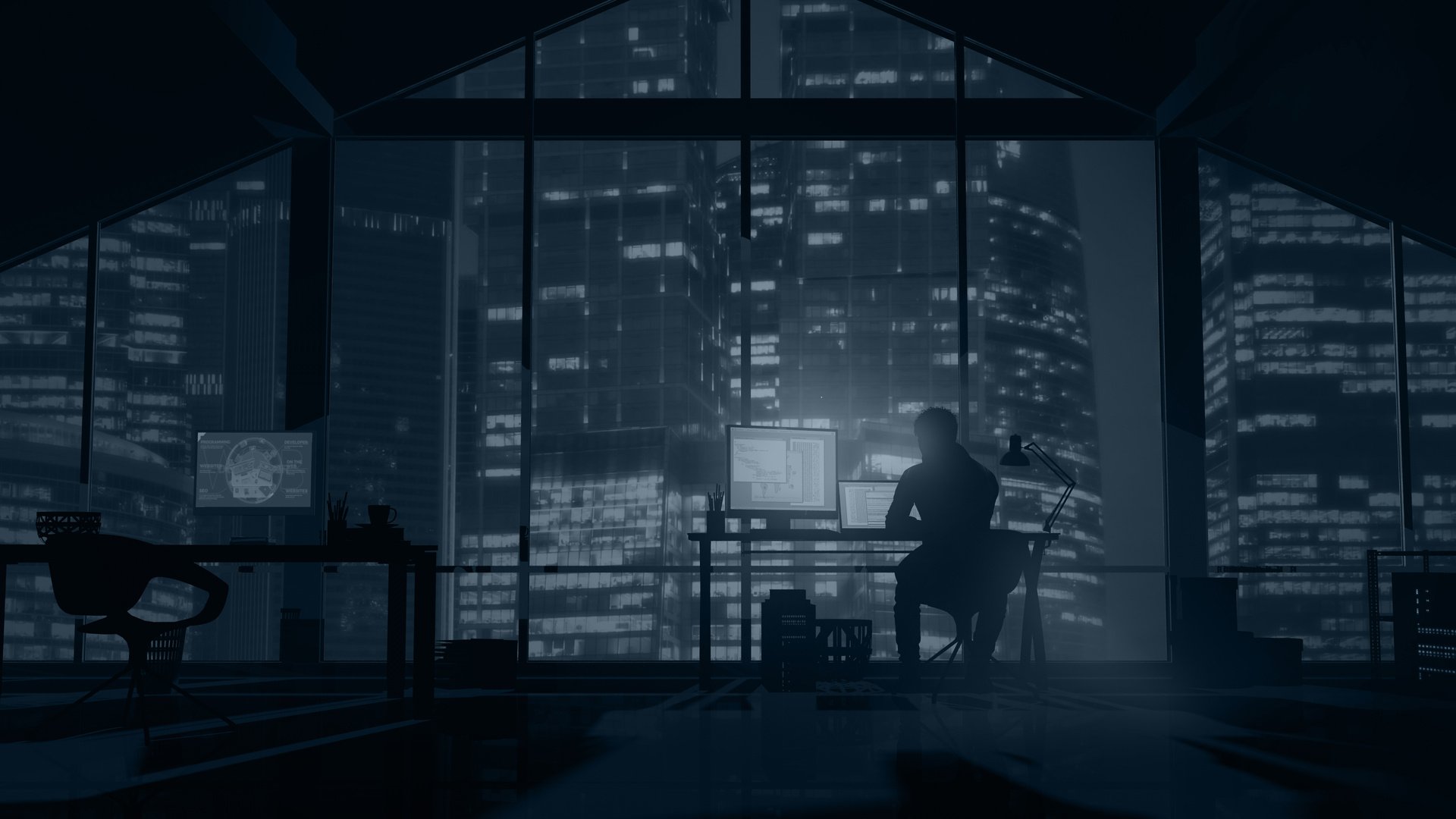 Web programmer on the background of evening skyscrapers.